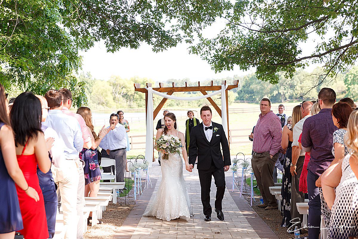 bride and groom wedding ceremony recessional | Lakeview Farms Wedding in Dover PA by Harrisburg Photographer Photography by Erin Leigh